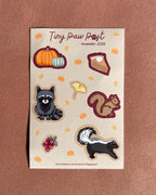 a tan sticker sheet with cute animal illustrations on blush velvet 