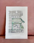 Illustration of a west village building with a green awning on white cotton paper