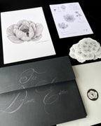 Floral-themed print club set including an anemone art print, sticker and a black envelope.