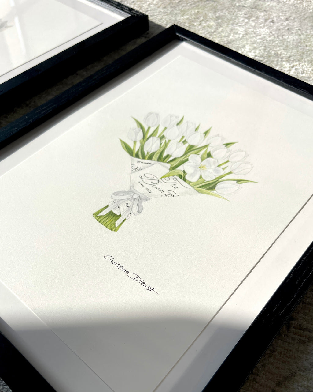 Framed artwork of a tulip color pencil drawing